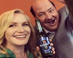 Angela Kinsey consuming alcohol